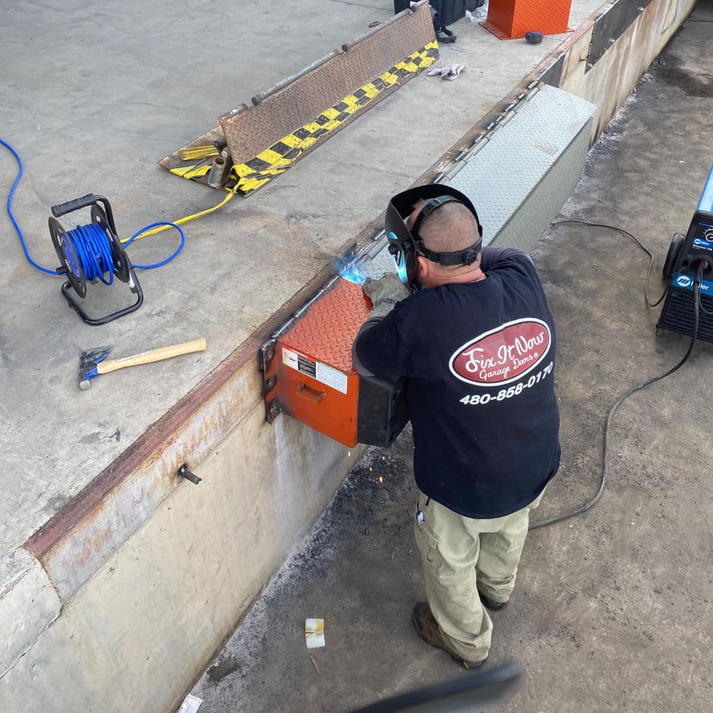 commercial welding services on a loading dock leveler