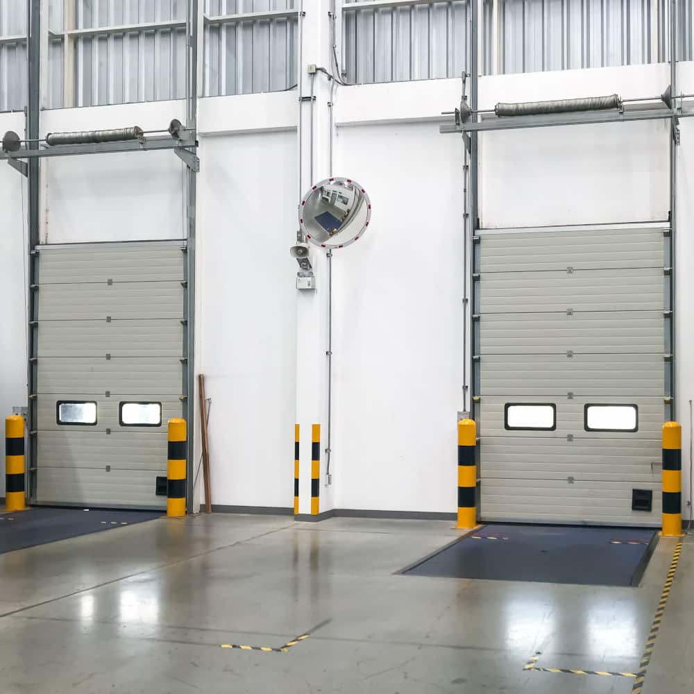 Example of forklift armor installed at commercial garage doors